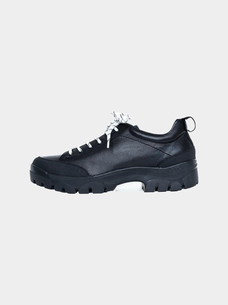 Paper Straight Alpine Hiker Black — side profile, textured cowhide and off-white laces