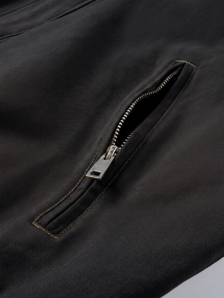 Wharf Jacket in Black, zipped pocket detail