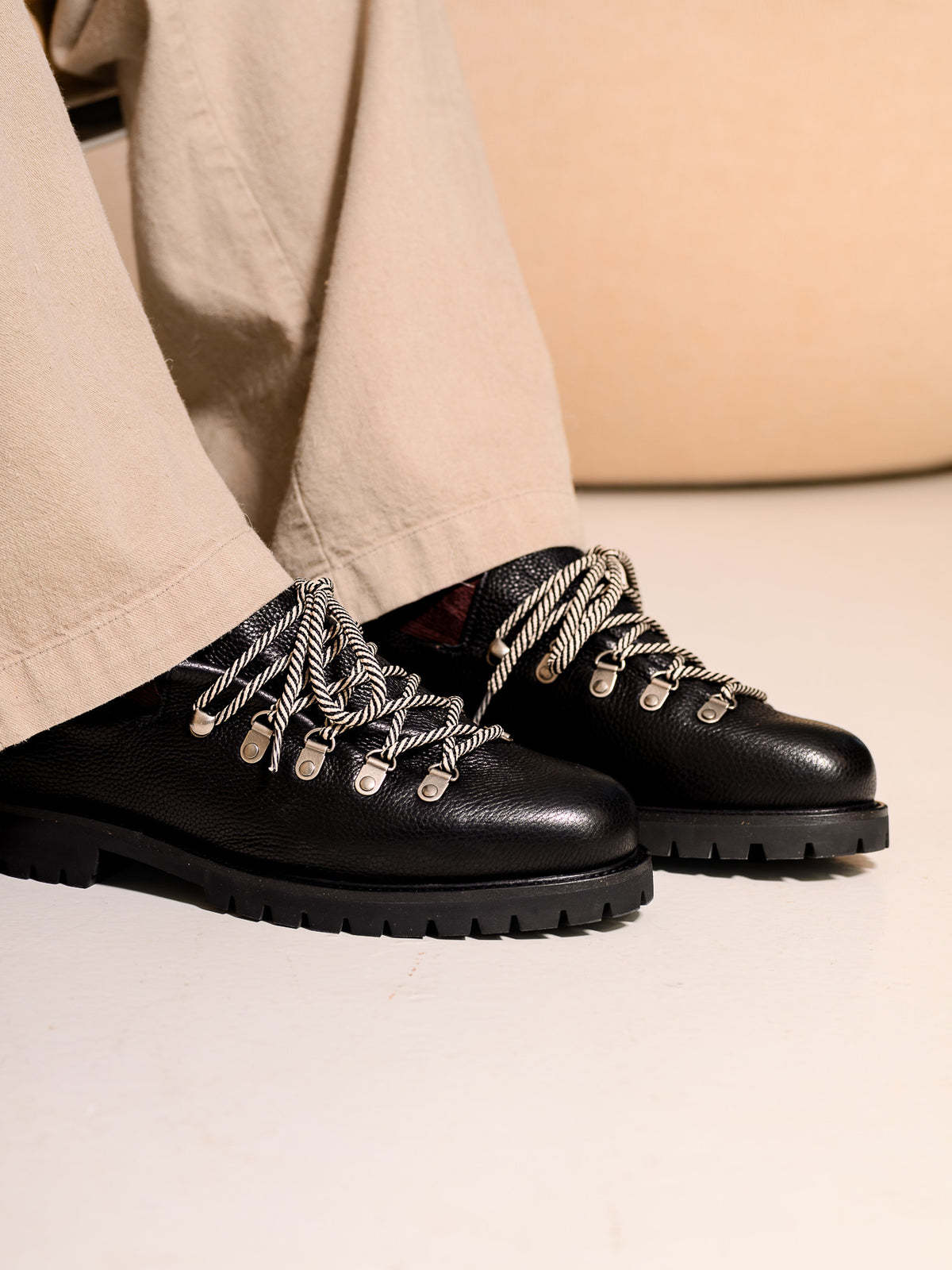 Paper Straight Heritage Derby Black Grain — worn with cream trousers, front view