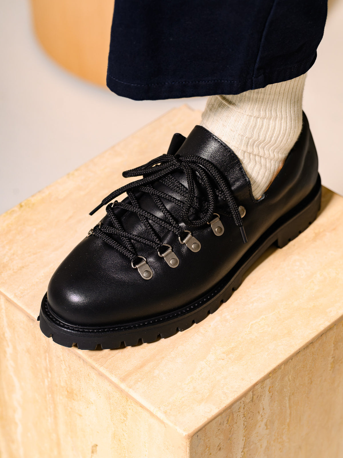 Paper Straight Heritage Derby Leather Black — close-up of smooth black leather and black laces