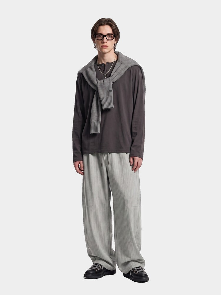 Marram Trouser in Light Grey, worn
