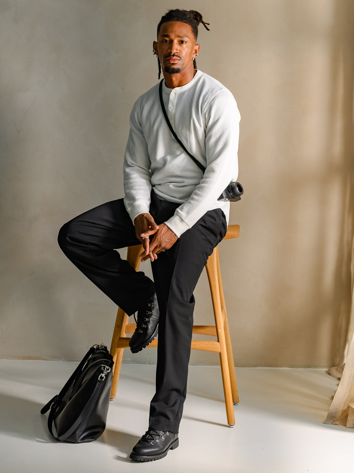 Paper Straight Ridgeworks High Black Grain — styled with a white knit and black trousers