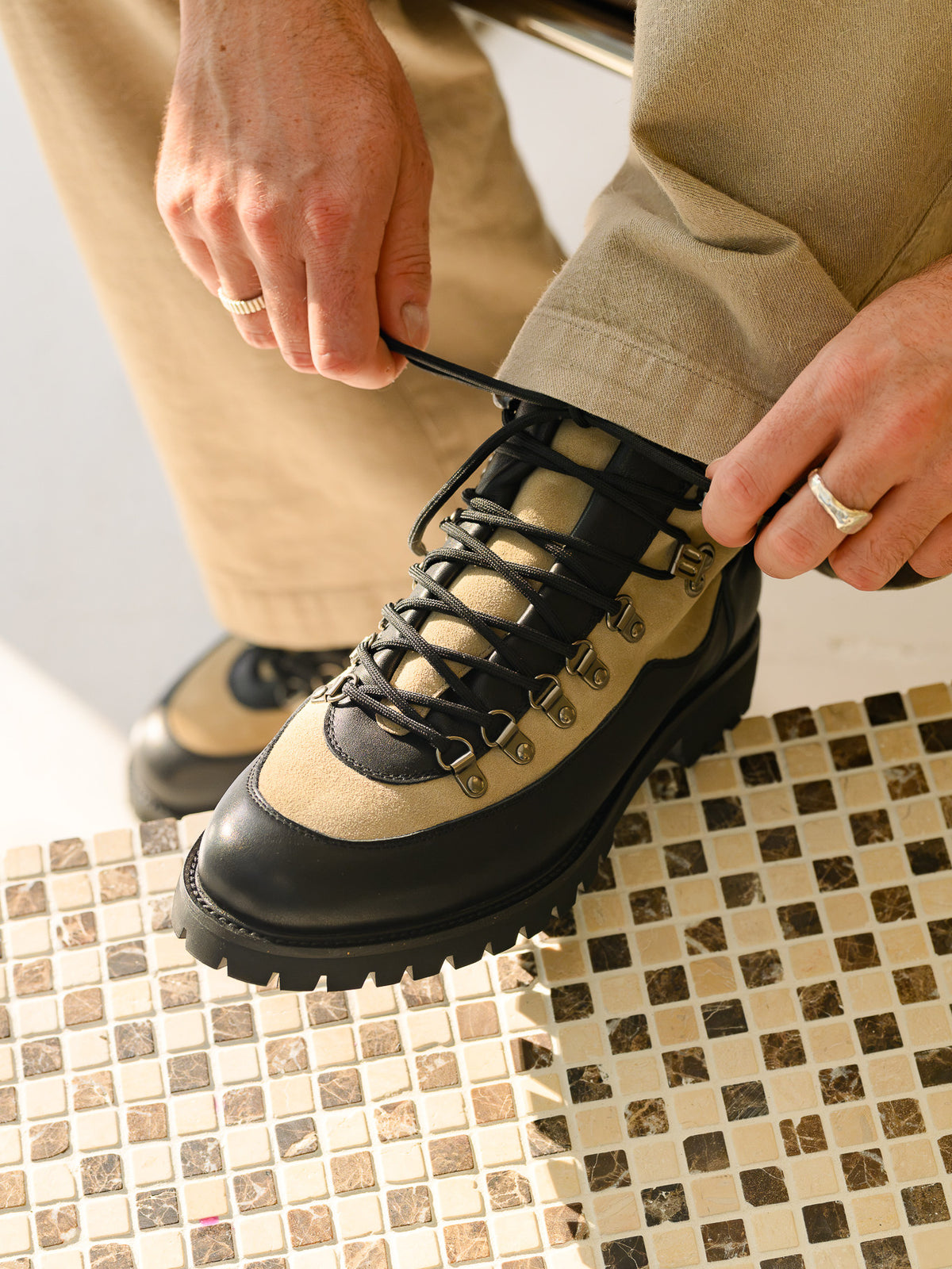 Paper Straight Ridgeworks High Khaki Suede — tightening the laces, three-quarter view
