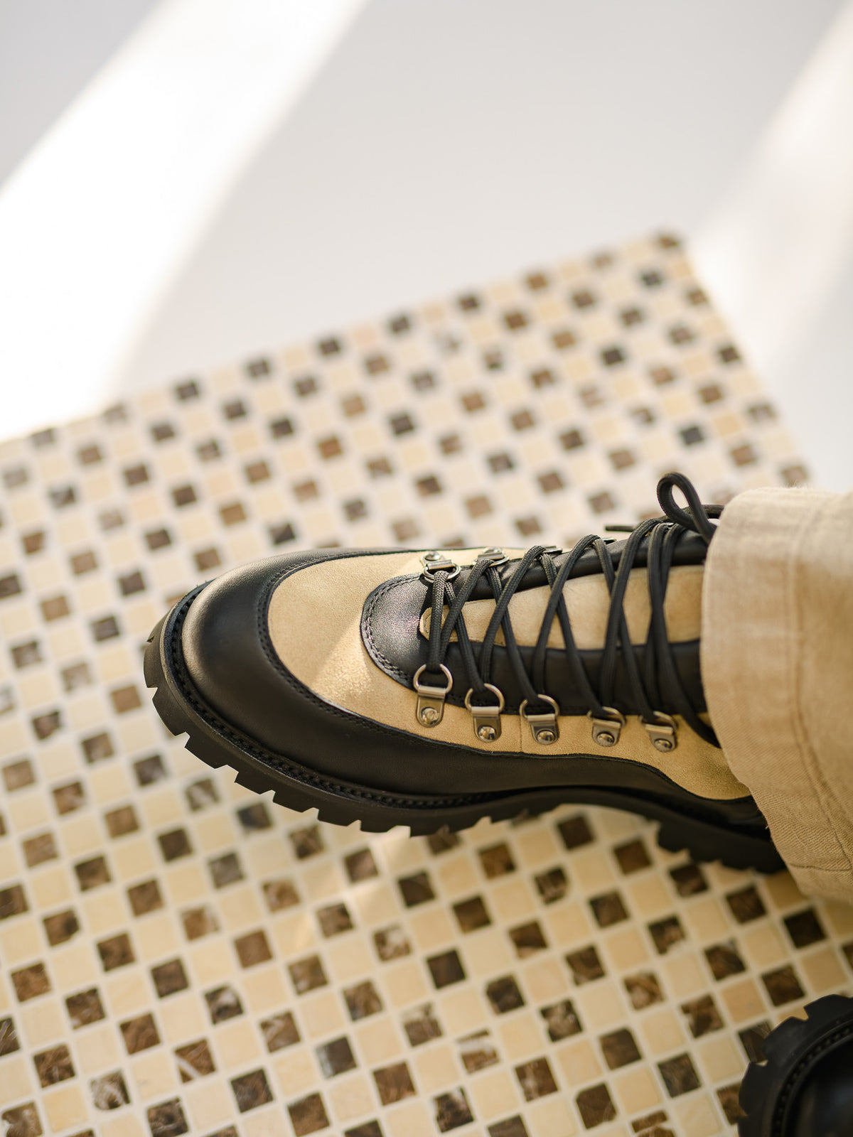 Paper Straight Ridgeworks High Khaki Suede — seen from above on a mosaic table