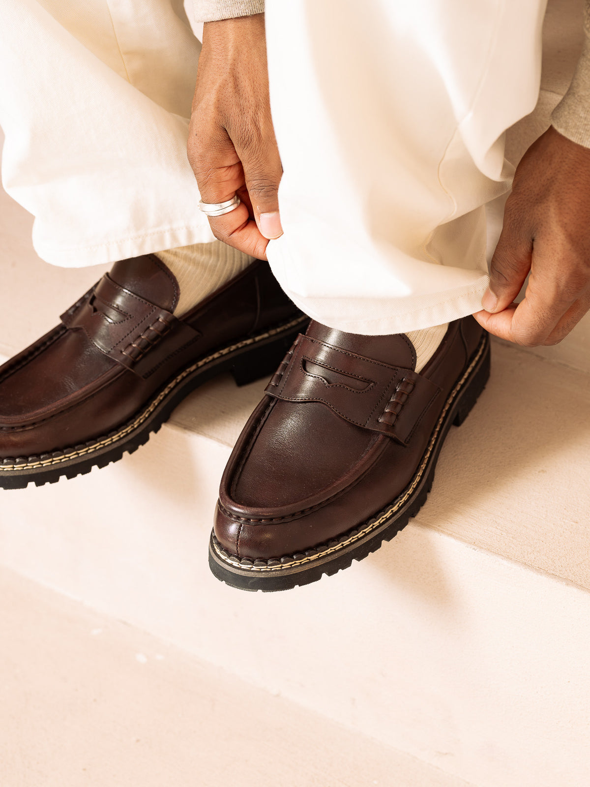 Paper Straight Atlas Loafer Brown — close-up of the penny strap and stitching