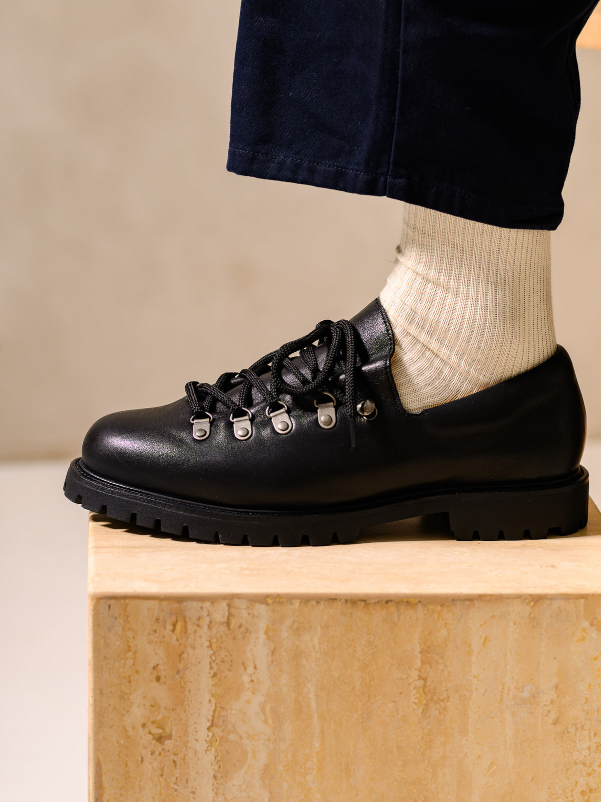 Paper Straight Heritage Derby Leather Black — worn with navy trousers, side profile