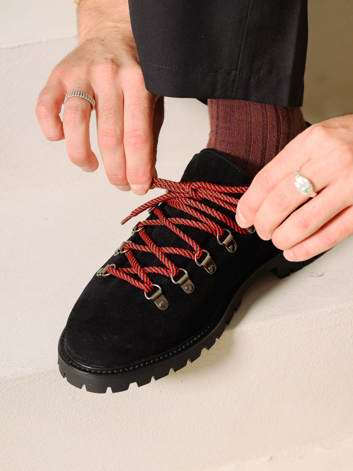 Paper Straight Heritage Derby Black Suede — close-up of black suede with red rope laces