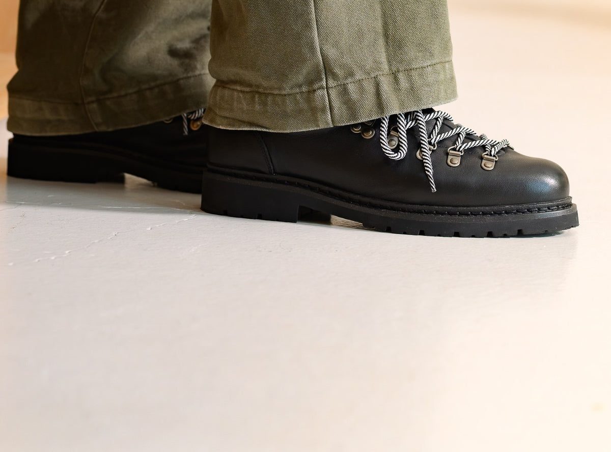 Paper Straight Summit Derby Signature in black leather worn with olive trousers