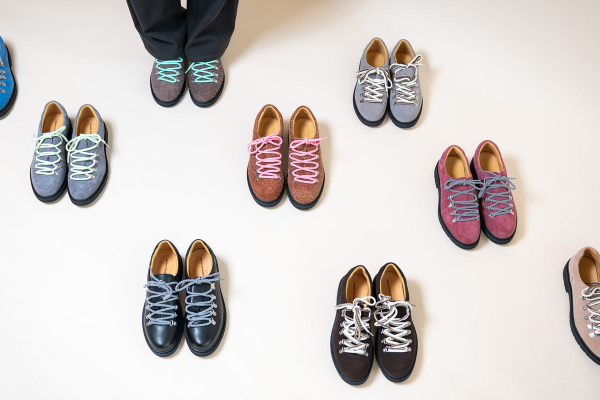 Paper Straight Summit Derby colourways laid out from above in blue, grey, brown, burgundy, black and sand suede