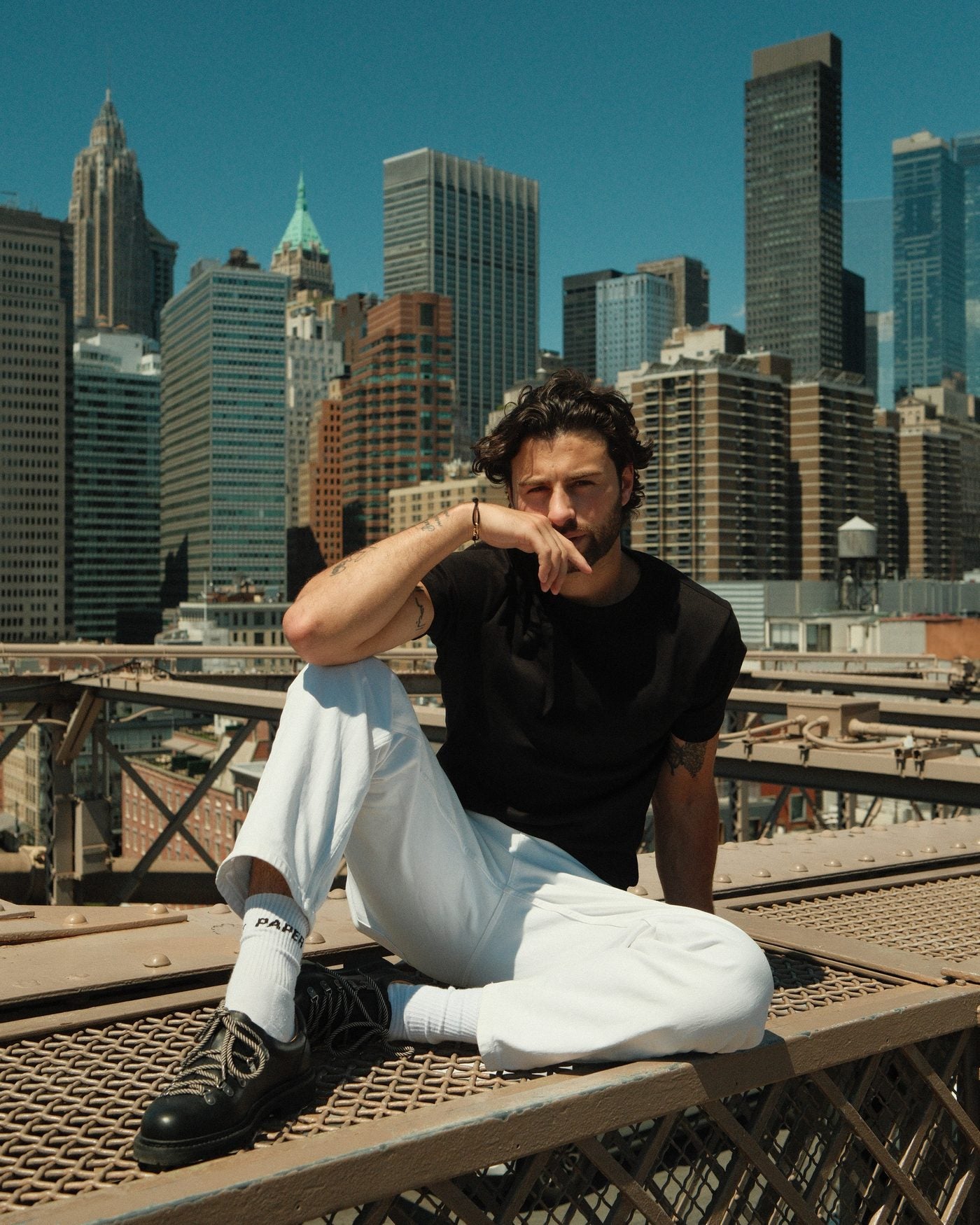 Paper Straight Summit Derby Signature worn on the Brooklyn Bridge