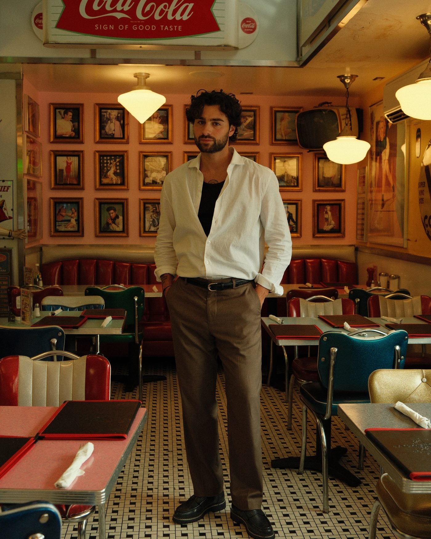 Paper Straight footwear worn in a New York diner